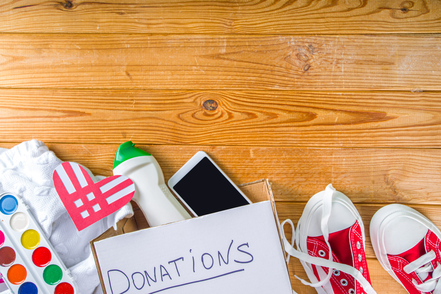 Donation Box with various give goods for Giving Tuesday